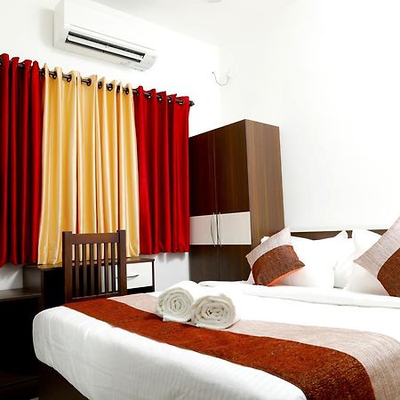Puthens Clifton Inn Kottayam Bagian luar foto