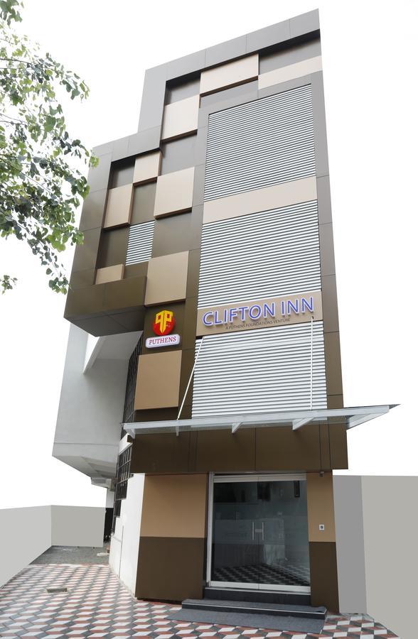 Puthens Clifton Inn Kottayam Bagian luar foto