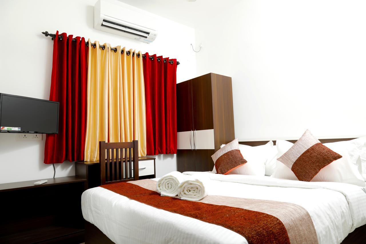Puthens Clifton Inn Kottayam Bagian luar foto