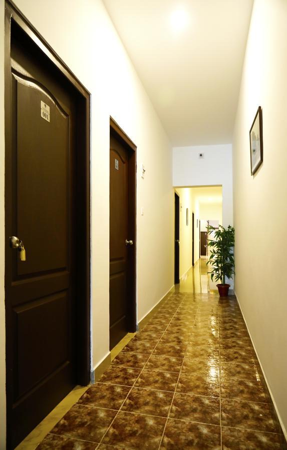 Puthens Clifton Inn Kottayam Bagian luar foto