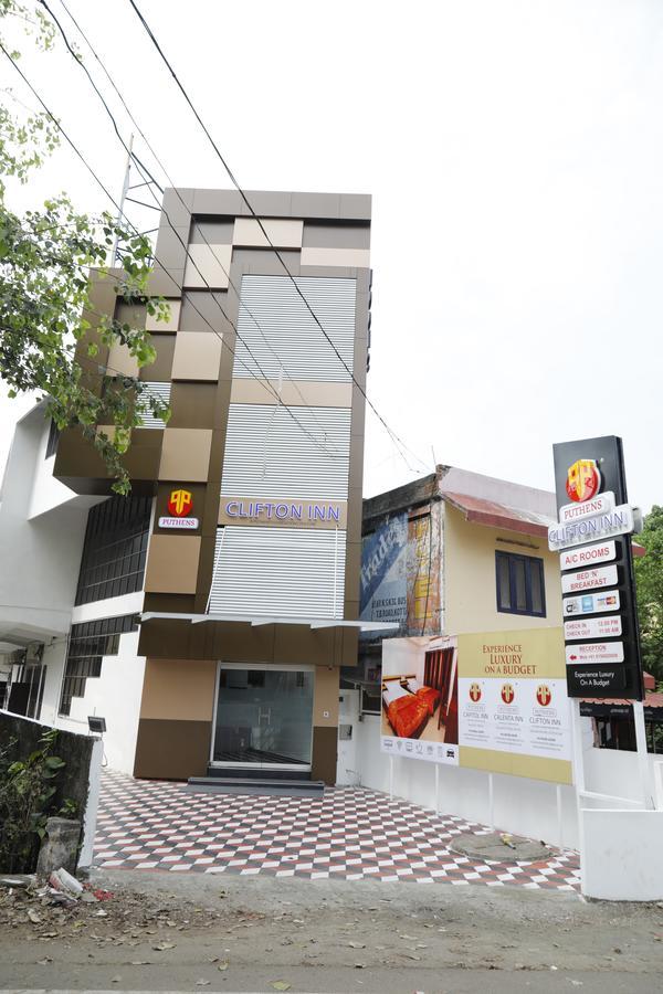 Puthens Clifton Inn Kottayam Bagian luar foto