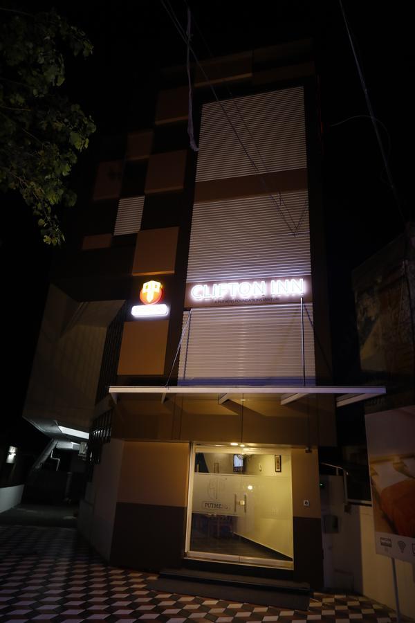 Puthens Clifton Inn Kottayam Bagian luar foto